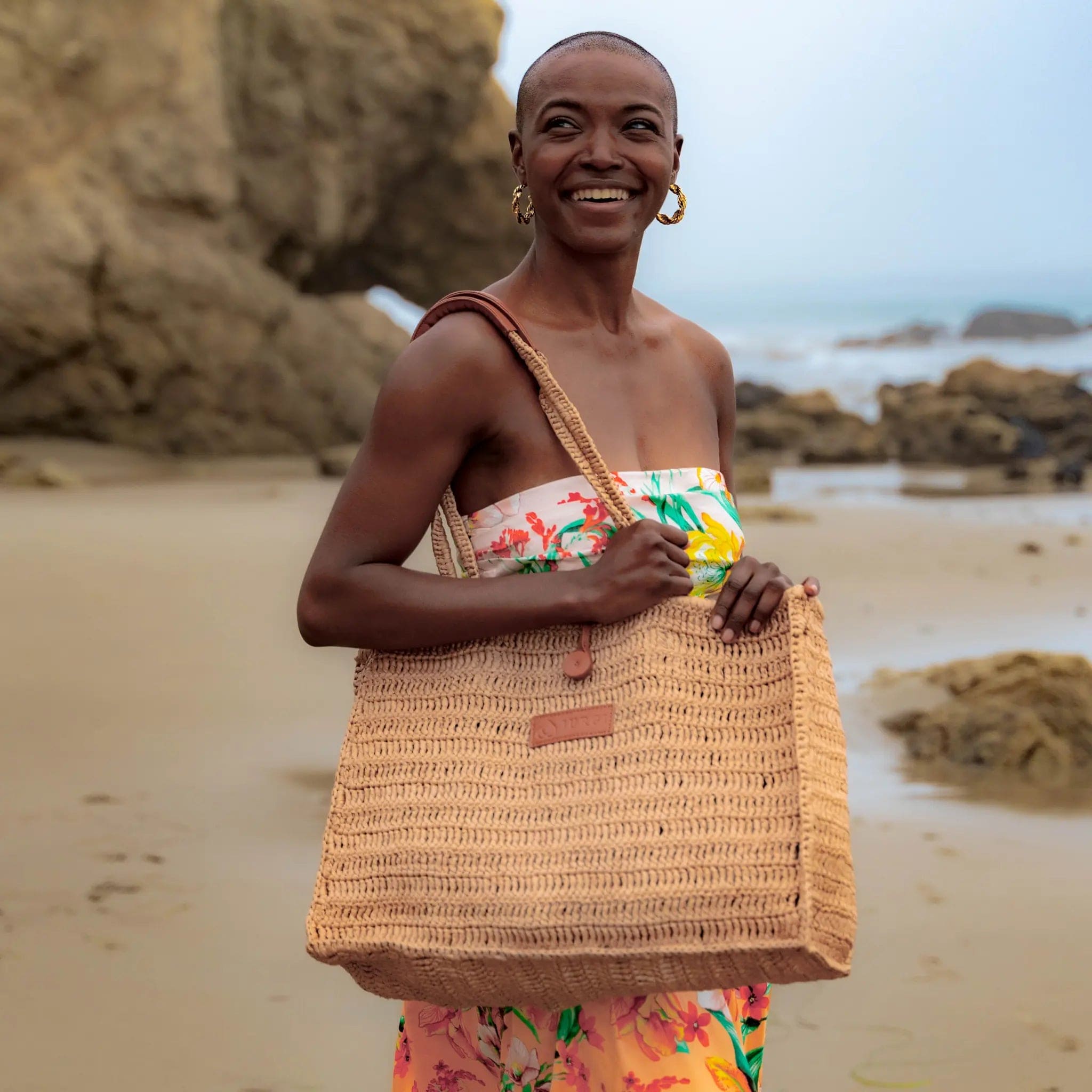 Beach bag and model on the beach