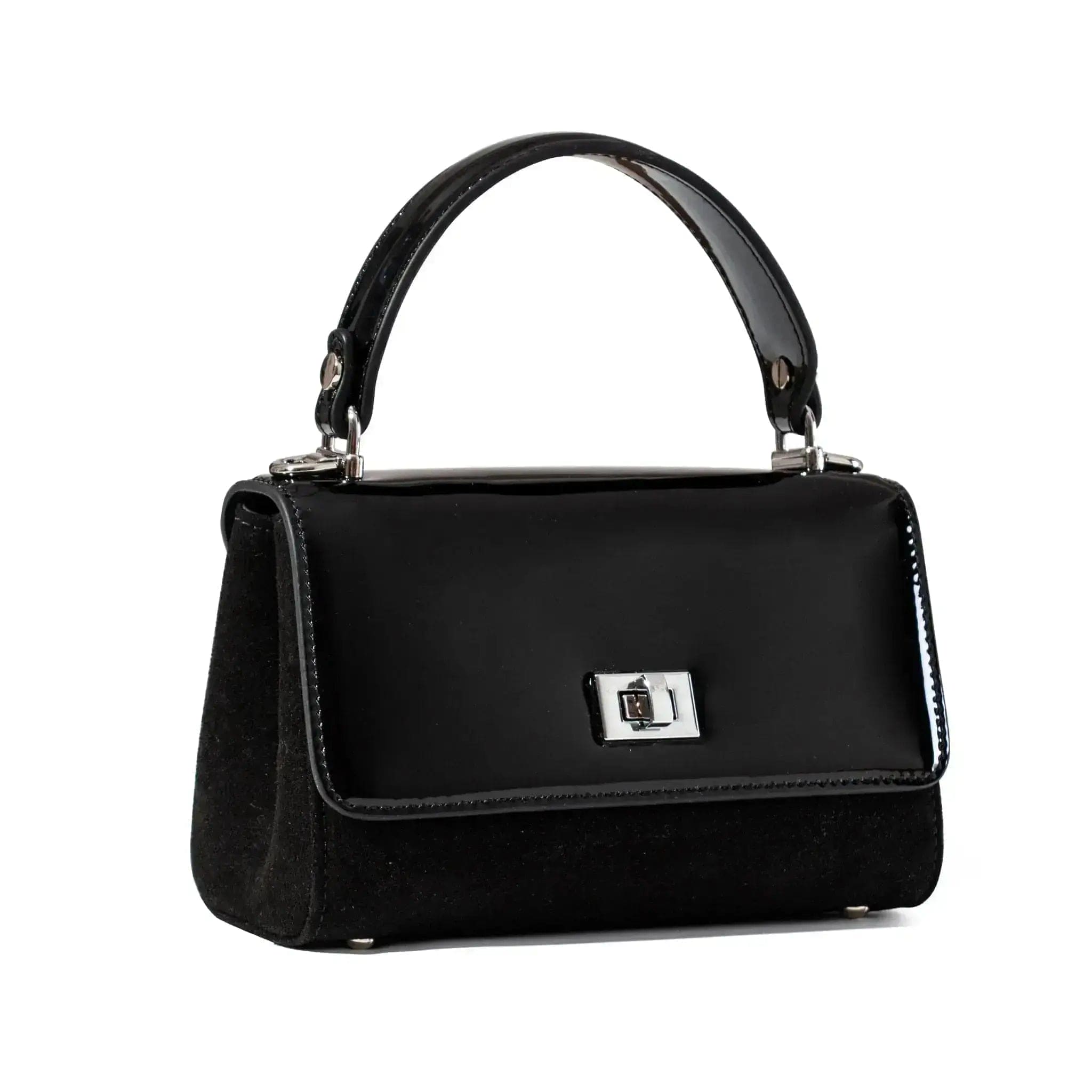 Black handbag with a shiny handle on a white background