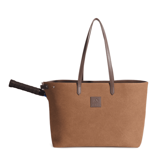 Brown canvas tennis tote with leather handles and racket compartment