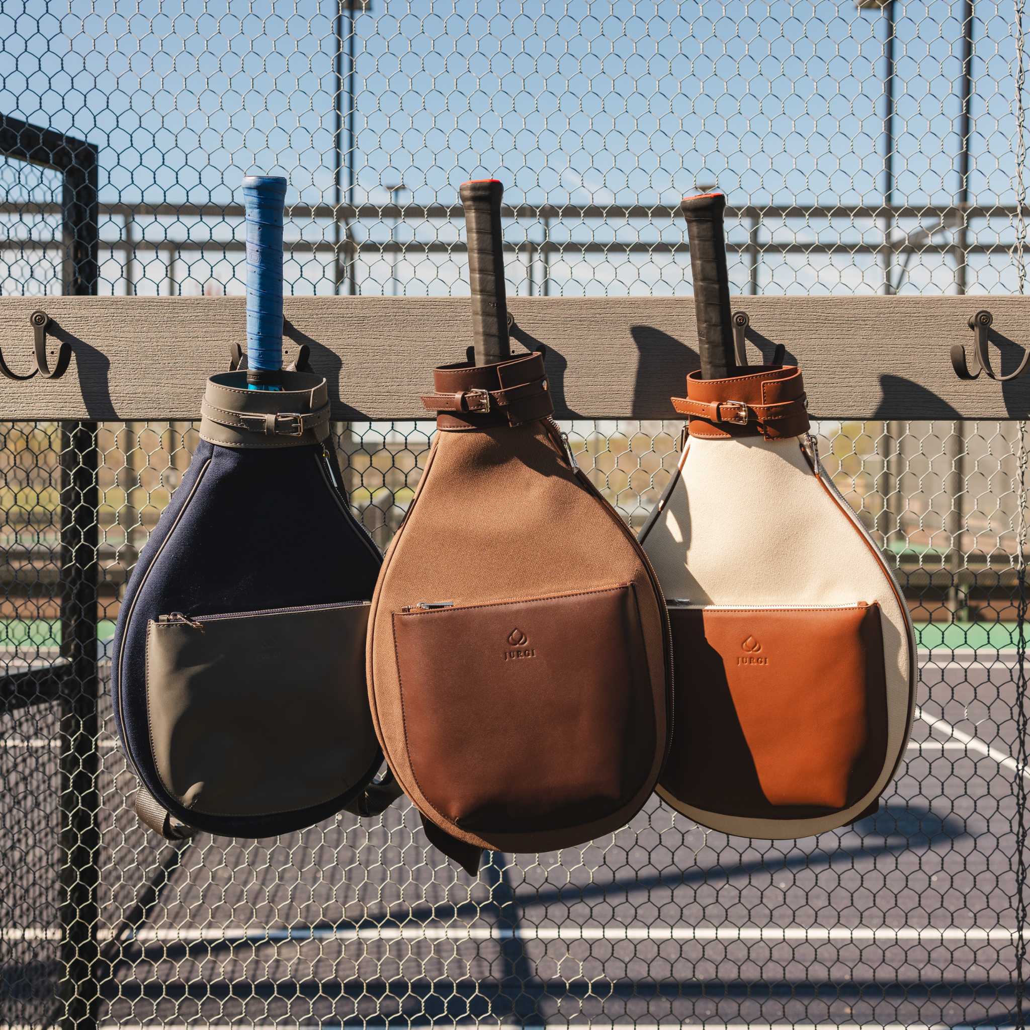 Brown leather and canvas tennis backpack