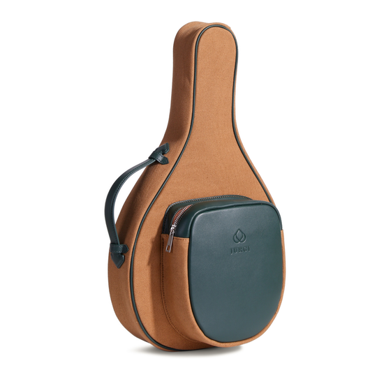 Two-tone brown and green padel bag with adjustable shoulder strap