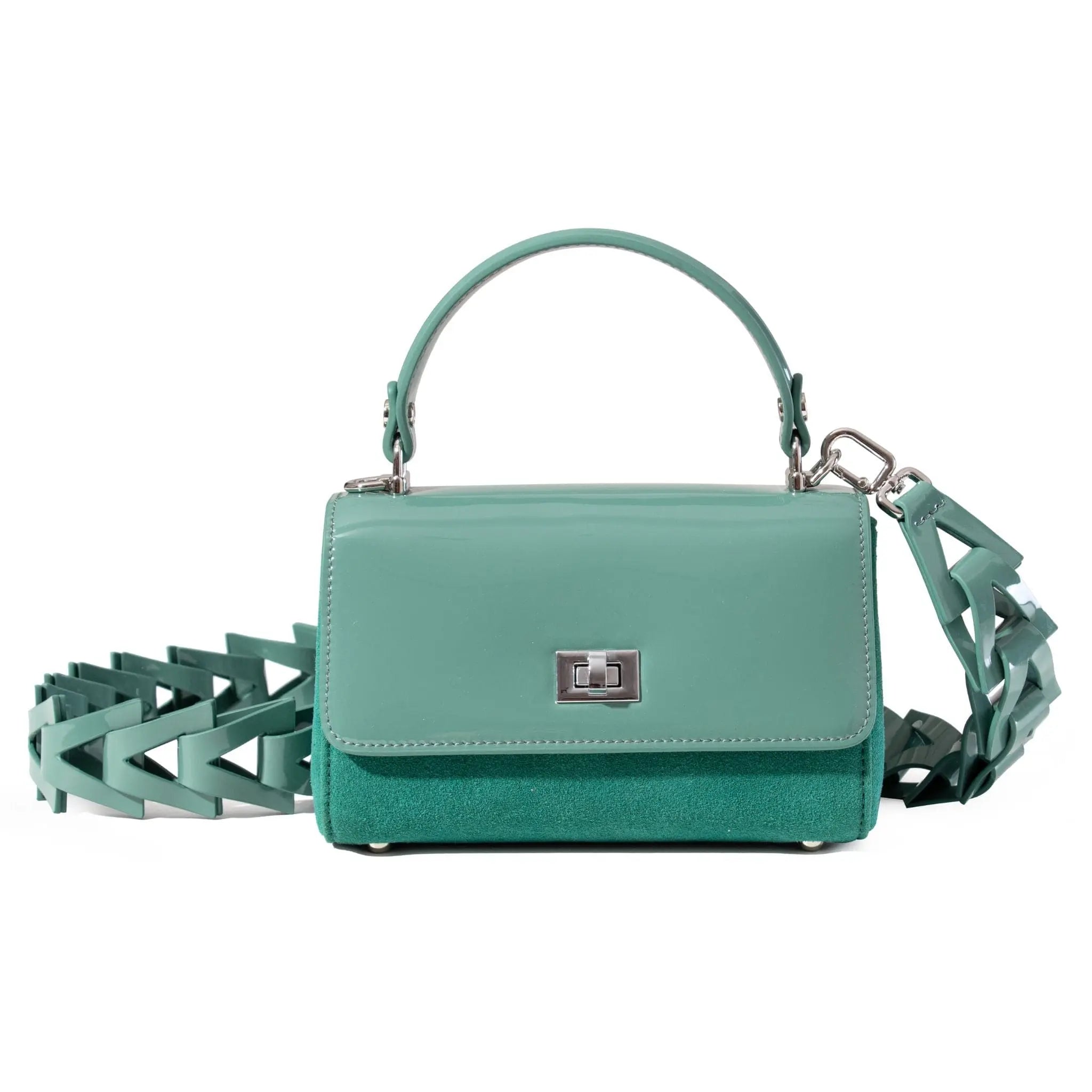 Teal handbag with a unique strap design on a white background