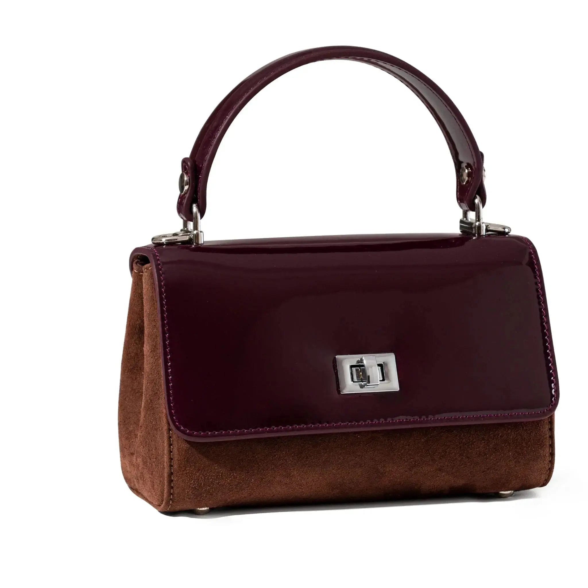 Brown handbag with a purple top section on a white background