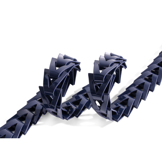 Navy triangle loop belt styled around the waist