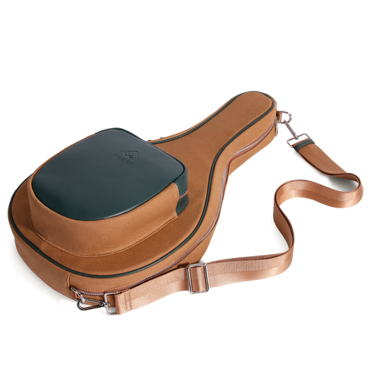 Brown canvas padel racket bag with green leather top pocket
