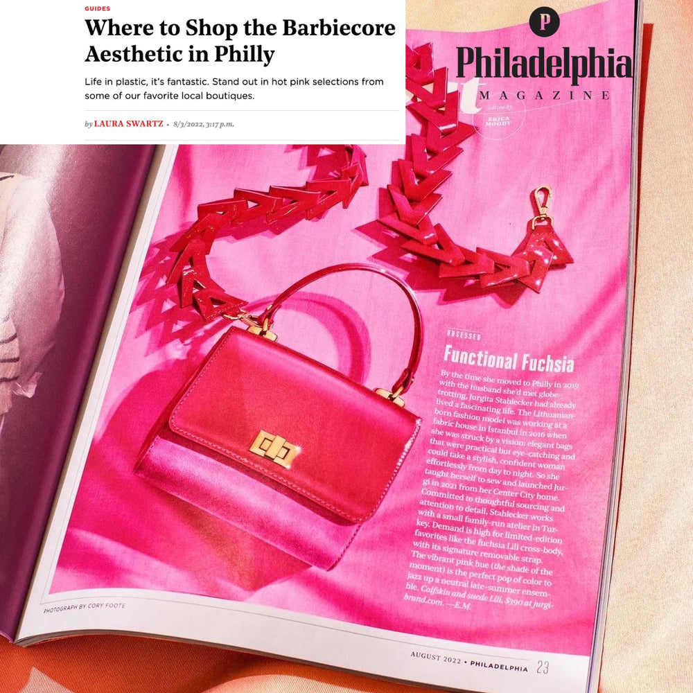 Magazine page with a pink handbag and jewelry on a pink background, featuring Philadelphia Magazine.