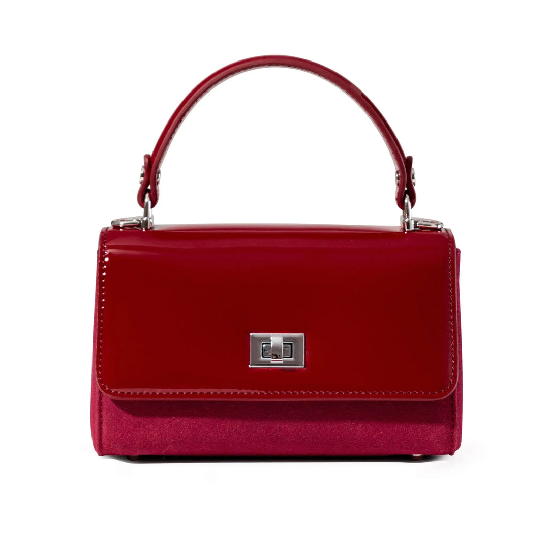 Red handbag with a silver clasp 