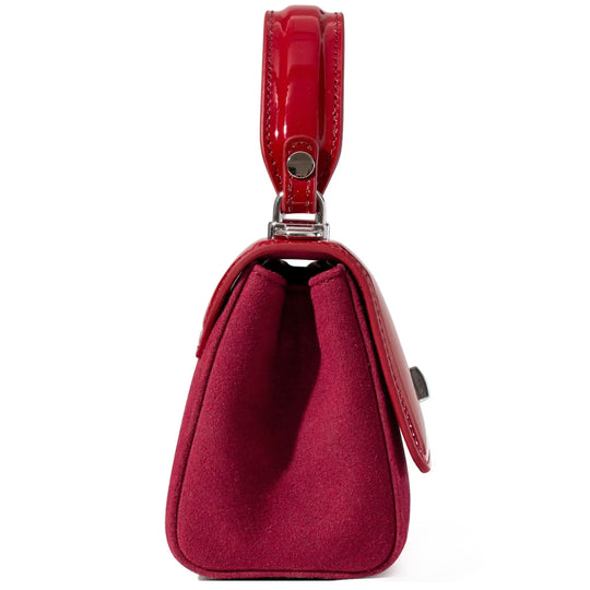 Red handbag with a strap from patent leather 
