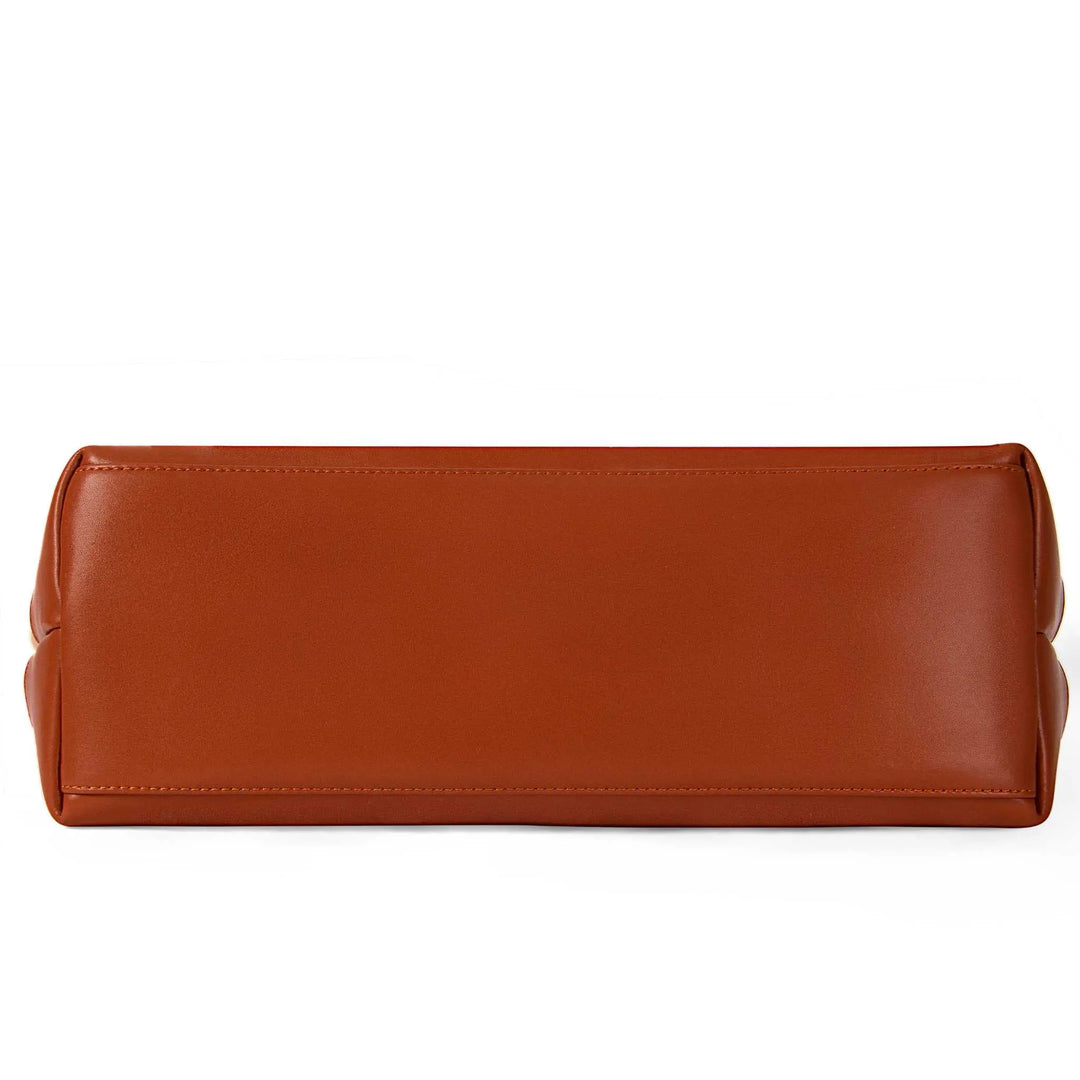 Designer canvas handbag with brown leather accents