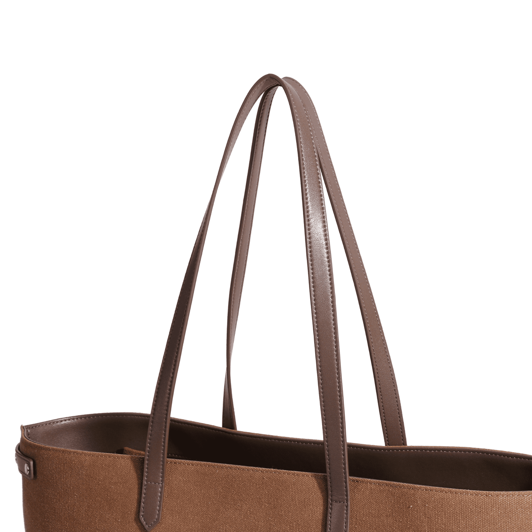 Minimalist brown tennis tote with structured shape and logo patch