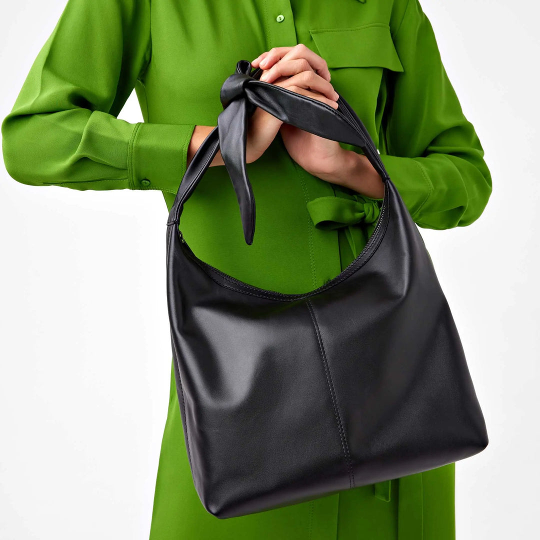 JURGI black knot strap bag in suede and leather, timeless everyday style
