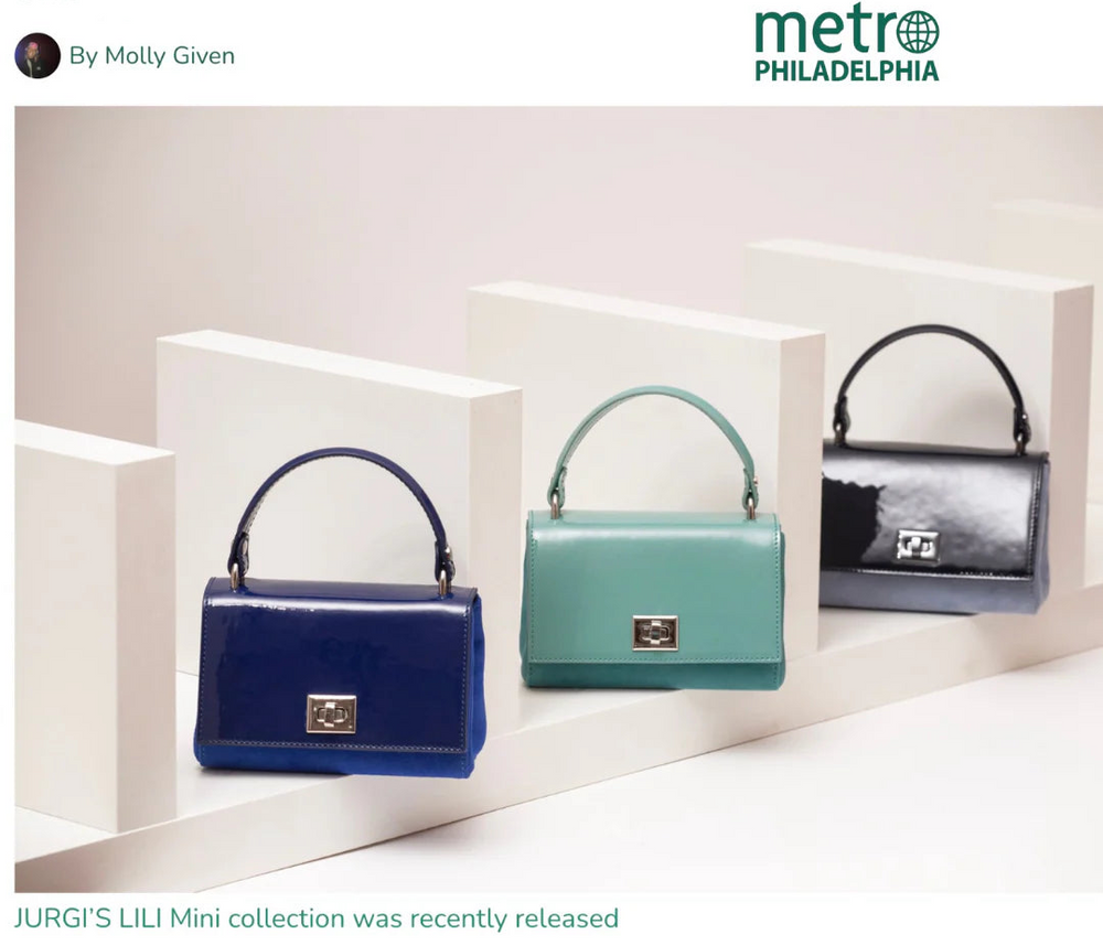Three handbags displayed on a white shelf with 'metro Philadelphia' branding.