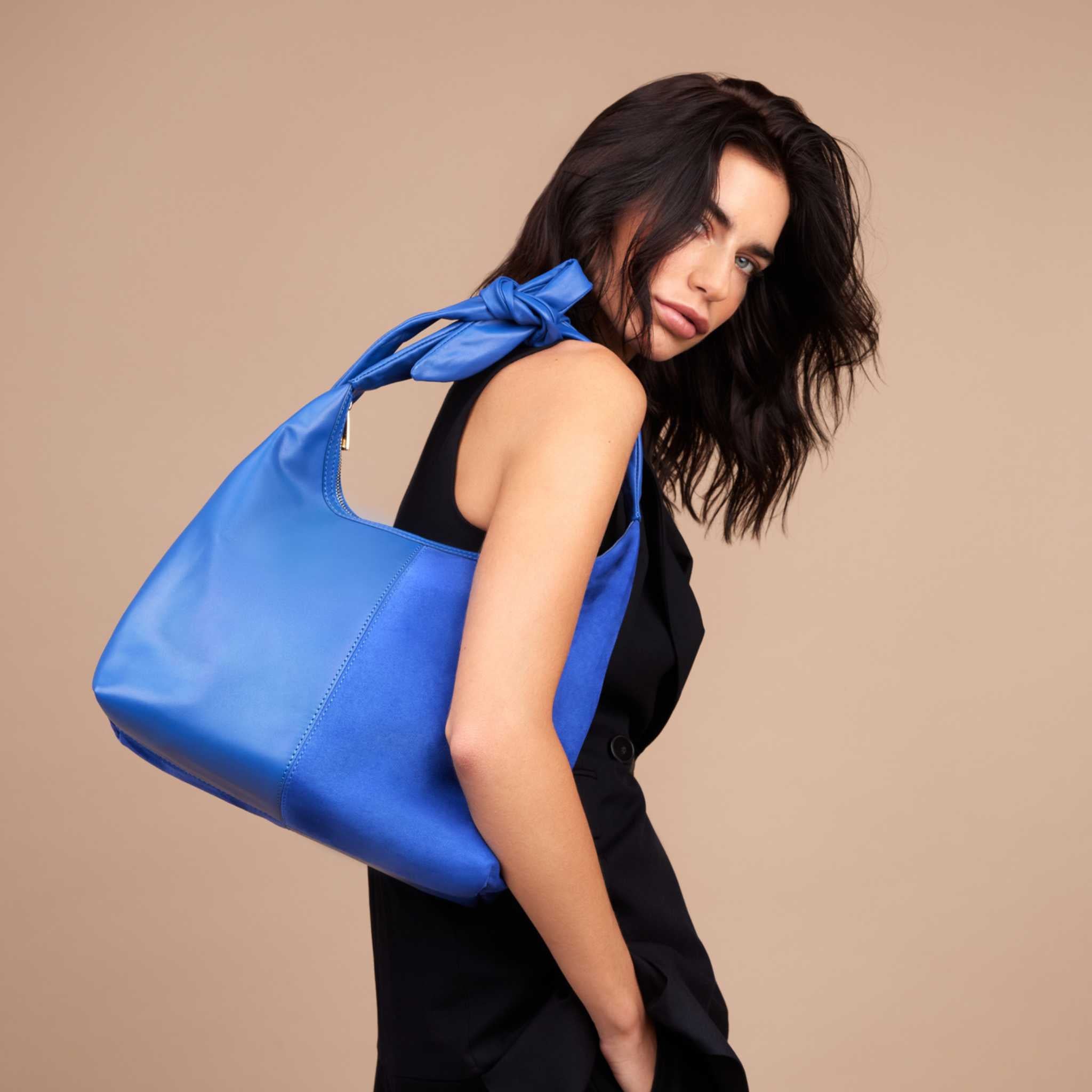 Blue knot strap suede and leather bag 