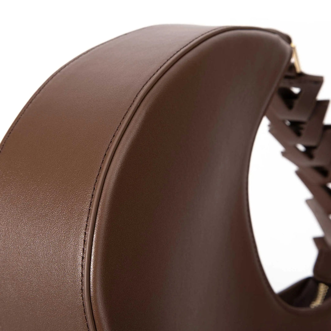Brown leather women’s handbag, stylish moon silhouette by JURGI