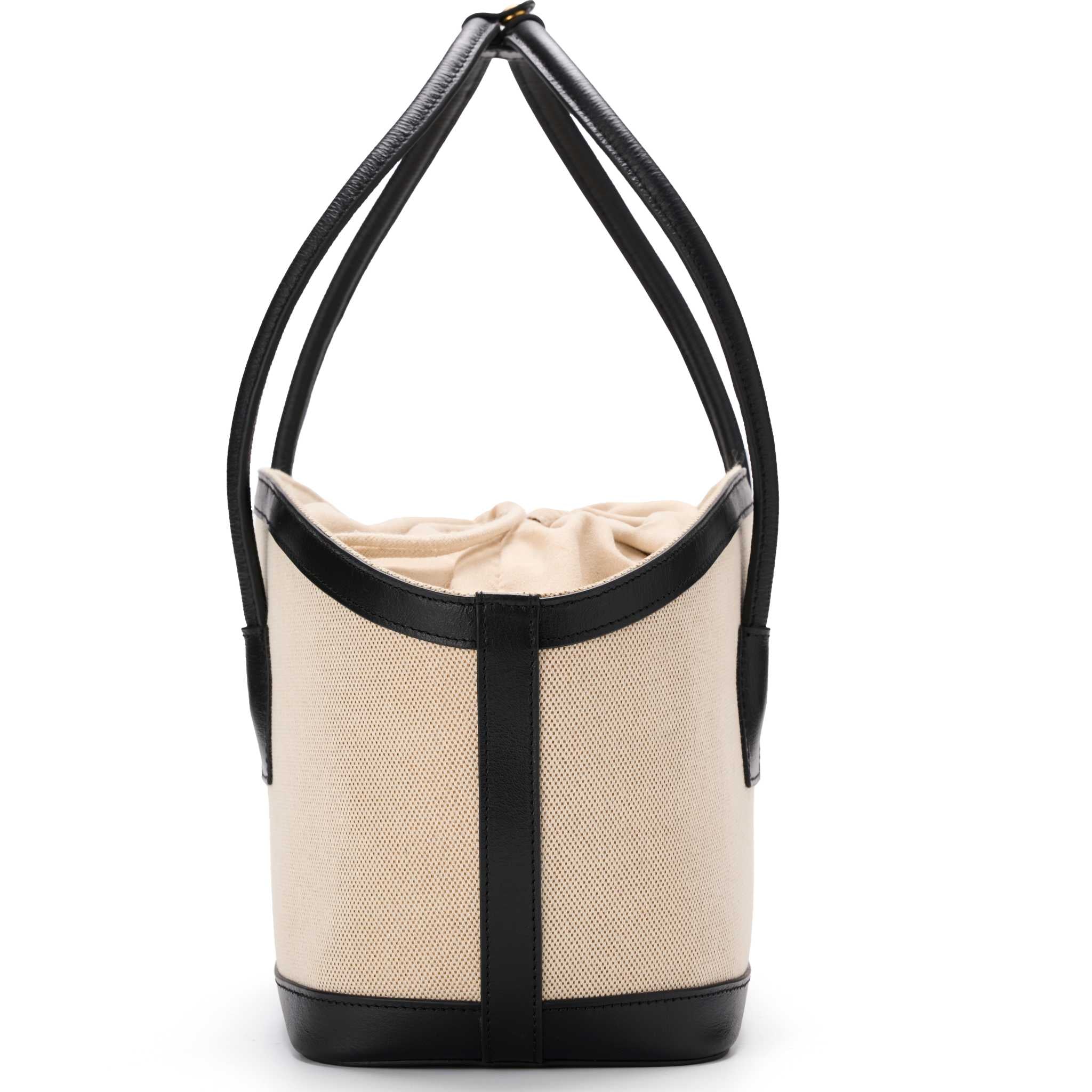 Canvas shoulder tote bag with drawstring closure and black leather details